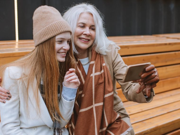 Mother and teenager taking a selfie