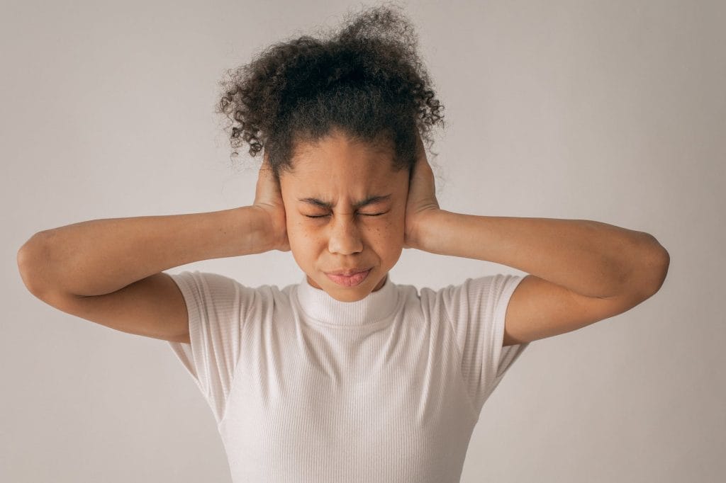 Neurodivergent child experiencing emotional overwhelm, illustrating the isolation of misunderstood grief