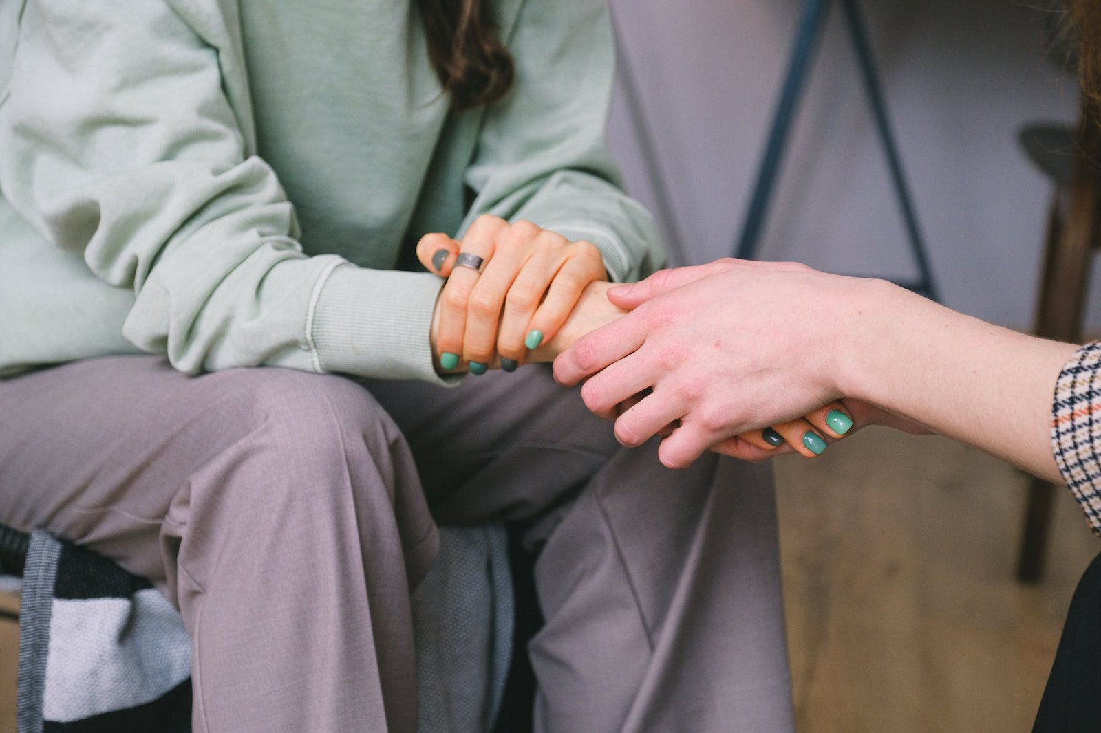 crop psychologist supporting patient during counseling indoors