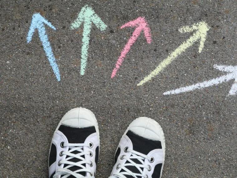 sneakers beside arrows