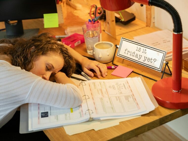 a woman sleeping on table