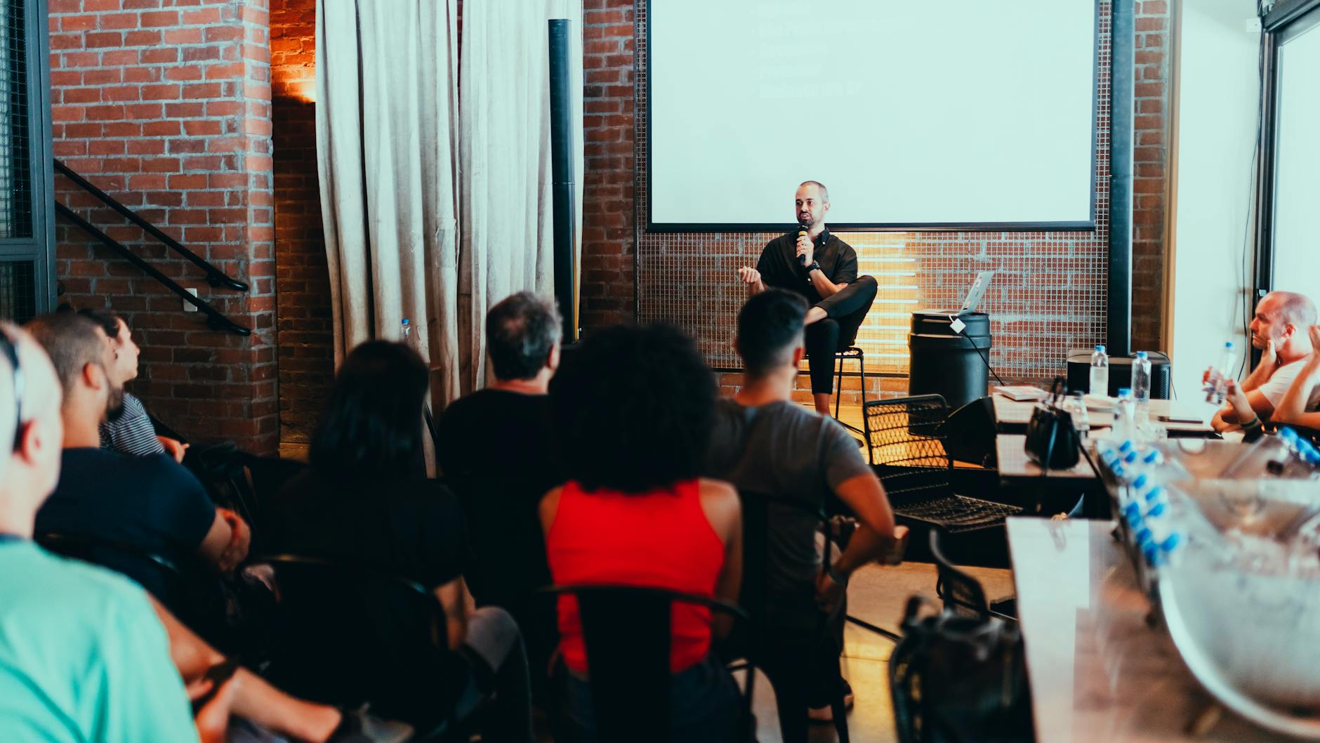 photo of man sitting in front of a personal growth workshop - neurodivergent-parent-burnout