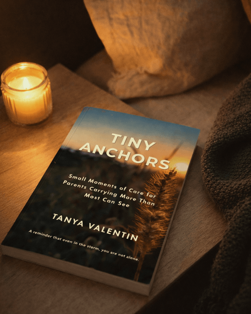 calm bedside table with candle representing emotional support for overwhelmed parents