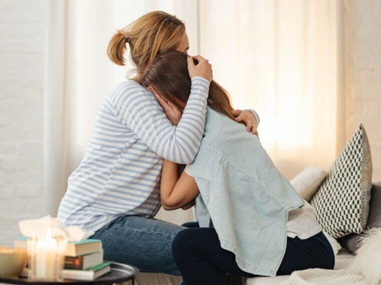 mother and daughter hugging