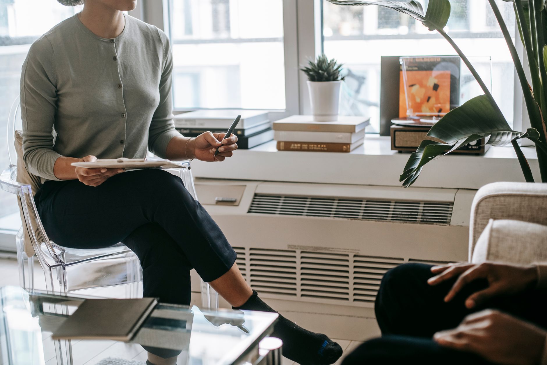 crop woman with clipboard talking with anonymous client - autistic burnout and marriage